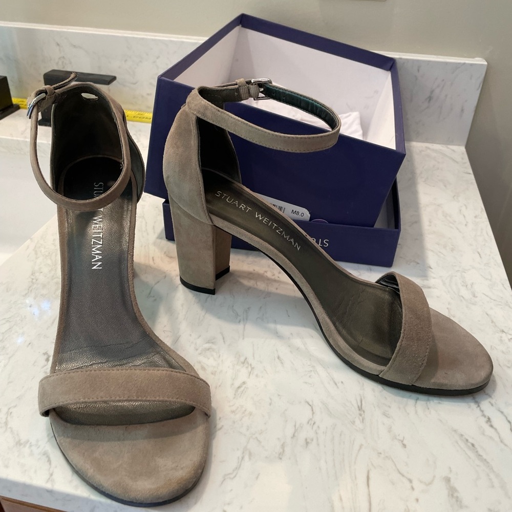 Stuart Weitzman gray suede sandal.
